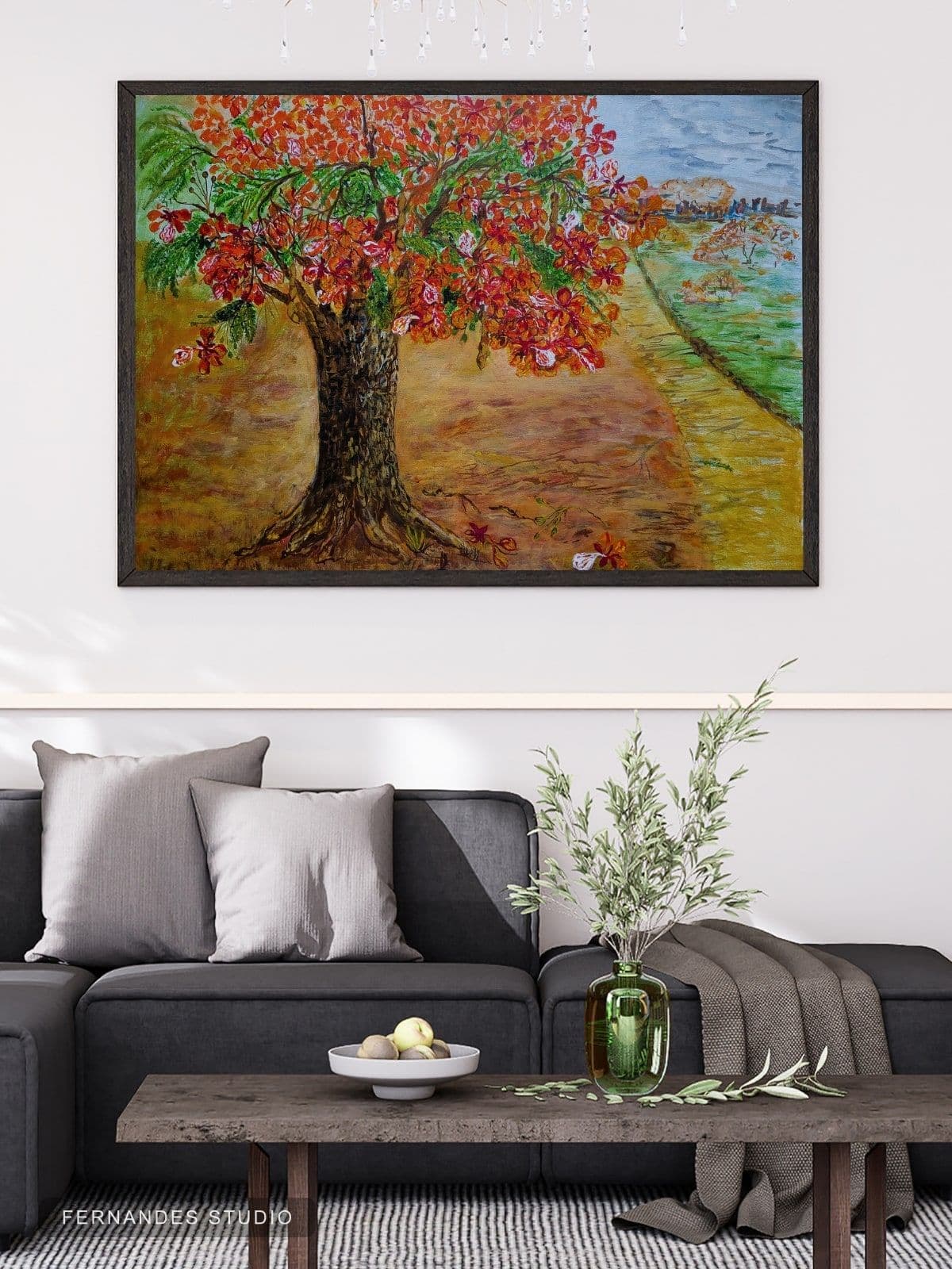Flame Tree by the River — a blooming gulmohar tree along a riverside path with a distant city skyline, framed on a gallery wall